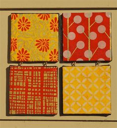 four square tiles with different designs on them, all in yellow and red color scheme