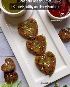 broccoli paneer cutlets on a white plate with dipping sauces in the background