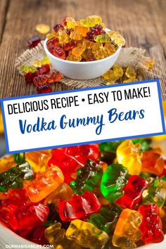 a bowl filled with gummy bears sitting on top of a table next to a sign that says delicious recipe - easy to make vodka gummy bears