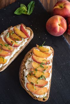 two pieces of bread with fruit on top