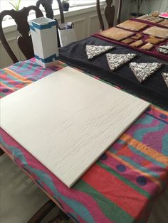 the table is covered with different types of fabric