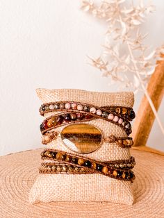 These gorgeous natural stone boho wrap bracelets are a staple! All handmade and beautifully crafted! Boho Wrap Bracelet, Stone Wrapping, Wrap Bracelets, Evil Eye Bracelet, Paper Clip, Tiger Eye, Festival Captain Hat, Chain Bracelet, Wrap Bracelet