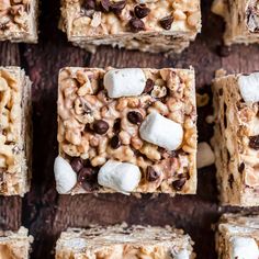 several squares of food with marshmallows and chocolate chips