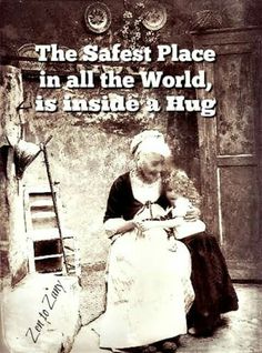 an old woman and child sitting in front of a wall with the words, the safest place in all the world is inside 8 hug