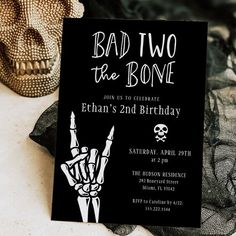 a black and white halloween party card with a skeleton