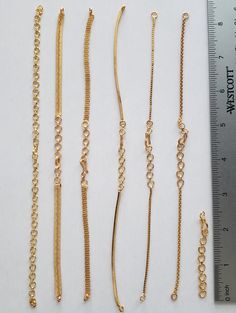 Matt finish 24k Solid Gold covering extensions. These gold Bracelet Extenders can be used to extend your short or long necklace. It can be a replacement for Dori patterns. These are high-quality adjustable extension Chains in antique gold finish. The end to end length for most extensions is 8 inches and 7th pattern in the picture is 2.5 inches. Elegant Yellow Gold Chain Bracelet With Extender, Gold Plated Chain Bracelet With Extender, Elegant Gold-plated Chain Bracelet With Extender, Elegant 14k Gold-filled Bracelet With Extender, Gold 14k Gold-filled Jewelry With Extender, Bracelet Extender, Kundan Jewellery Set, Jewellery Set, Kundan Jewellery