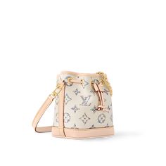 LOUIS VUITTON® - Nano Noé - Multicolore Blanc Lv Bags Louis Vuitton Handbags, Louis Vuitton Sac, Louis Vuitton Gifts, White Louis Vuitton, Bags Louis Vuitton, Trunk Bag, Lv Bags, Luxury Purses, Louis Vuitton Official