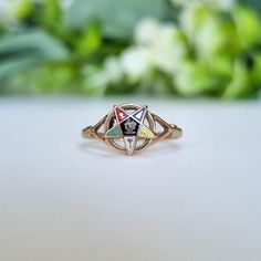 A unique vintage enamel and gold ring, featuring the symbol of the Masonic Order of The Eastern Star. Metal/Hallmarks ~ hallmarked for 9ct gold, Birmingham, 1972. UK Size ~ K 1/2 US Size ~ 5 1/2 Stones ~ the ring features a star design associated with the Masonic Order of The Eastern Star, in multi coloured enamel. Weight ~ 1.5g Any boxes or props shown in the pictures are not included unless stated above. If you have any questions please ask! ✦ Find us on Instagram @crumpetvintage - feel free t Antique Gold Open Signet Ring, Victorian Hallmarked Rose Gold Signet Ring, Victorian Gold Signet Ring With Cabochon, Antique Open Signet Ring Collectible, Gold Cameo Signet Ring Collectible, Masonic Order, Order Of The Eastern Star, Antique Locket, Georgian Jewelry