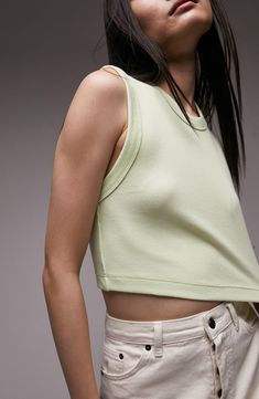 Bare a bit of belly with a summery staple tank. Crewneck 95% cotton, 5% elastane Machine wash, dry flat Imported