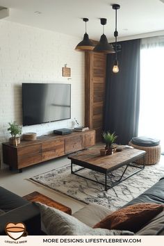 a living room filled with furniture and a flat screen tv on top of a wooden entertainment center