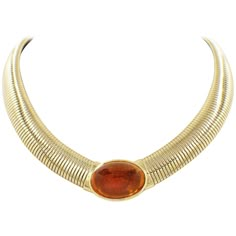 Cartier Vintage Signed Jewelry Style: Tubugas Yellow Gold Collar Necklace with Amber Cabochon Serial Number: 745623 Metal: 18k Yellow Gold Size: 14 Inches Dimensions: 14 - 15 MM in width / 3 MM thick Weight: 111.5 grams Total Carat Weight: 18.50 cts Stone Shape: Amber Cabochon Size: 19 MM x 25 MM x 14 MM Hallmark: Cartier 745623 Includes: Certified Appraisal Retail Value: $50,000 Vintage Cartier Necklace, Necklace Blood, Cartier Vintage, Vintage Chain Necklace, Dope Jewelry Accessories, Thick Necklace, Dior Necklace, Gold Collar Necklace, Vintage Choker