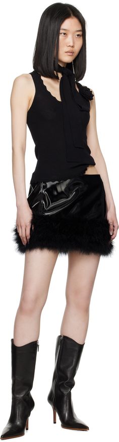 Patent faux-leather skirt. · Paneled construction · Marabou turkey feather trim at hem · Concealed zip closure at back · Full twill lining Supplier color: Black Trim: 100% meleagris feathers. Chic Skirt With Feather Trim, Feather Trim Skirt For Night Out, Leather Miniskirt, Faux Leather Midi Skirt, Feather Skirt, Leather Midi Skirt, Feather Trim, Embellished Denim, Black Feathers