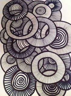 an intricate drawing with circles and spirals in black ink on white paper, by artist susan