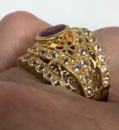 Unusual Deep Toned Ruby finished 925 Sterling Filigree Setting Handmade size 6.5 Can be resized. My jeweler charged $20 All rings are shipped in a nice gift box. Check out our over a THOUSAND great reviews Engraving is $4 per letter and is not always perfect depending on the piece. It can take a few days if the jeweler is busy. This is payable to Paypal Judithsltd@gmail.com Gold Filigree Ring With Accent Stones For Anniversary, Anniversary Gold Filigree Ring With Accent Stones, Unique Hand Set Rings For Anniversary, Exquisite Gold Ring With Stone Setting, Exquisite Gold Rings With Stone Setting, Unique Gold Ruby Ring For Anniversary, Unique Hand Set Gold Rings, Saphir Ring, Pink Ruby