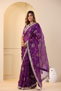 Go for this beautiful purple embroidered organza saree at parties and festive occasions. The saree comes with an embroidered blouse. Shop designer saree online in USA from Pure Elegance. Disclaimer: The actual product may vary slightly from the image. These are custom orders, hence expect slight variation in color, placement of the motif or buta. ESTIMATED DELIVERYBecause this is a custom order, it would take about 4 weeks from the date of purchase. RETURN POLICYThis product is a custom order an Purple Pre-draped Saree With Zari Work For Celebration, Purple Dola Silk Pre-draped Saree, Purple Chanderi Pre-draped Saree For Wedding, Purple Georgette Pre-draped Saree For Festivals, Embroidered Purple Georgette Pre-draped Saree, Purple Tissue Silk Pre-draped Saree With Sheer Dupatta, Purple Georgette Pre-draped Saree For Eid, Purple Pre-draped Saree With Dupatta, Purple Organza Pre-draped Saree With Dupatta