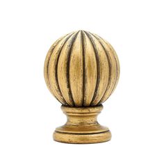 an antique brass ball finial with black stripes on the top and bottom, against a white background