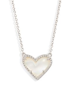 This whimsical pendant necklace charms with a colorful heart set in an etched metal frame. Style Name:Kendra Scott Ari Heart Pendant Necklace. Style Number: 5921868. Necklaces Heart, Key Pendant Necklace, Kendra Scott Necklace, Necklace Charms, Cultured Pearl Necklace, Initial Pendant Necklace, Heart Drop Earrings, White Gold Necklaces, Key Pendant