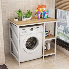 a washing machine sitting in front of a window next to a shelf filled with cleaning products