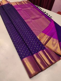 1.this is beautiful pure kanjivaram silk sari with 1 gram gold zari weaving with running blouse piece 2.this sari is 5.5 mt length  3.this is a very elegant looking sari for all occasions like weddings and other formal events  4.fall n pico is complimentary  5.blouse can be made as per the the requirements of the clients with proper measurements.stiching charges will be extra  6.plz check the availability of the sari before placing the order Blue Silk Saree, Altar Design, Kanjivaram Sarees Silk, Simple Saree Designs, New Saree Designs, Sarees Silk, Simple Sarees, Royal Look, Kanjivaram Sarees