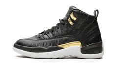 The Air Jordan 12 Retro "Snakeskin" is treating women to an outstanding lifestyle sneaker.  Souped up with style, the pair creates a premium colorway with the slick combination of black and metallic gold.  The offering brings a variety of textures as some areas are covered in smooth leather and others display different snakeskin patterns.  The luxe Air Jordan 12 is rounded out with metallic gold lacelets and a matching midfoot plate, as well as a white outsole finish. Womens Air Jordan, Snake Skin Shoes, White Jordans, Air Jordan 12, Air Jordan 12 Retro, Womens Air Jordans, Jordans Women, Jordan 12 Retro, Jordan 12