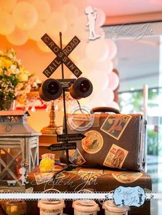 an assortment of desserts on display in front of a window