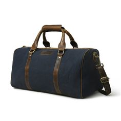 Trustpilot Our Campbell canvas duffle is a perfect weekend duffel travel bag to carry your travel essentials in a stylish and sophisticated manner. Handcrafted from the finest quality Canvas and buffalo leather, robust stitching, nickel hardware, and high-quality zippers ensure perfection and durability. It is a stylish duffel bag that is lightweight and heavy-duty to ensure comfort, practicality, and durability altogether. Crafted in a contrasting combination of blue and brown color that gives The Blue Lagoon, Leather Weekender, Leather Craftsmen, Leather Duffle Bag, Leather Duffle, Duffel Bag Travel, Nickel Hardware, Buffalo Leather, Blue And Brown