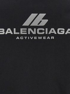 Balenciaga's hoodie crafted in black stretch cotton jersey with reflective logo print at chest / at back. It features front zip closure, kangaroo pockets, long sleeves, ribbed edges and straight hem.Gender: WOMENMaterial: T COTTON 92%;T ELASTAN 8%;R VISCOSE 85%Color: BlackMade in: ITProduct ID: 788243TQVV11000*Import tax/duty will be calculated at checkout (If applicable) Balenciaga Sweatshirt, Balenciaga Hoodie, Balenciaga Sweater, Valentino Garavani Bag, Balenciaga Logo, Versace Shop, Saint Laurent Shoes, Luxury Dress, Knitwear Tops