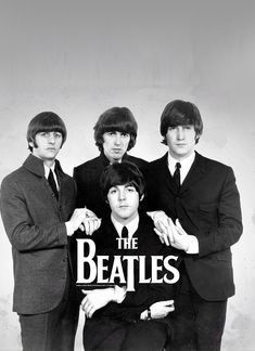 black and white photograph of the beatles