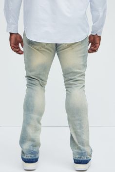 Available In Light Wash. Flared Fit Stretch Denim 85% Cotton 13% Polyester 2% Spandex Disclaimer: Due To The Specialized Distressing & Wash Process, Each Garment Is Unique. Zip Fly Button Closure 5 Pocket Detail Distressed Detail Ripped Patch Knee Detail Imported | Mens Below Me Distressed Skinny Flare Jeans in Light Wash size 38 by Fashion Nova Fitted Distressed Jeans For Spring, Spring Distressed Fitted Jeans, Stretch Distressed Faded Bottoms, Fitted Distressed Faded Bottoms, Ripped Fitted Cotton Jeans, Fitted Light Wash Distressed Jeans, Fitted Ripped Cotton Jeans, Fitted Distressed Light Wash Bottoms, Fitted Light Wash Distressed Bottoms