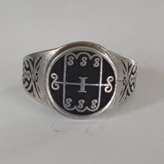 If we do not show your ring size in inventory, please contact us so we can update our listings. You are looking at our Marquis Amon ring from The Lesser Key Of Solomon. Marquis Amon (Aamon) --- Tells of all things past and future, procures feuds, and reconciles controversies between friends and foes. Grand Marquis of Hell that governs 40 infernal legions, and the 7th spirit of the Goetia. He is the demon of life and reproduction. The beautiful pewter ring is a silver color and the background is Vintage Adjustable Initial Ring, Symbolic Stamped Collectible Rings, Amon Demon, Lesser Key Of Solomon, Key Of Solomon, Ars Goetia, Pewter Ring, Grand Marquis, Between Friends