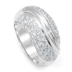 a white gold ring with diamonds on the inside and outside, set in 18k white gold