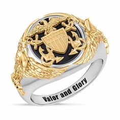 The U.S. Navy is recognized as one of the finest fighting forces in the world. Now, in a fitting tribute to these brave individuals, the Danbury Mint is proud to present a boldly designed men’s ring, as distinguished as the sailor who wears it. This extraordinary ring:Custom-cut genuine black onyx center stone emblazoned with a gleaming Navy emblem in raised relief.    Two proud American eagles, richly plated with 14kt gold, are perched on the ring's shoulders.    The words that define a sailor' Army Rings, Navy Emblem, Us Navy Ships, Eagle Ring, Army Veteran, Danbury Mint, U S Navy, Size 10 Rings, Men's Rings