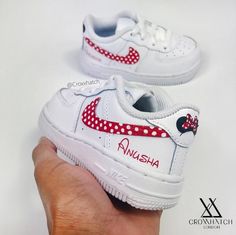 This hype custom Nike Air Force One shoe is handmade (it is both a men’s and women’s sneaker, a unisex sneaker and a perfect birthday gift or purchase for a sneakerhead). Every shoe is perfectly handcrafted to your desired choice. We carefully add and sew fabric to a retail brought pair of shoes. We aim to deliver you the best custom shoes you'll ever own. These shoes are made to last with light to medium wear, not for RECKLESS wear! Go to www.OmaneCustoms.com For the BEST Customs! Minnie & Mickey Painted Shoes, Custom Nike Baby, Mom And Daughter Nike Shoes, Custom Nike Airforce 1 Kids, Af1 Disney Custom, Custom Nike Airforce 1 Baby, Air Force Bebe, Custom Baby Shoes, Air Force 1 Sneakers