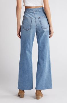 Add a retro vibe in wide-legged jeans finished with unfinished hems and cut from stretch-kissed Japanese denim. 30" inseam; 22" leg opening; 12 1/2" front rise; 15" back rise (size 29) Zip fly with button closure Front welt pockets 98% cotton, 2% polyurethane Machine wash, line dry Made in the USA of imported fabric Chic Denim Flares For Spring, Fitted Wide Leg Flares With Frayed Hem, Summer Wide-leg Flares With Frayed Hem, Denim Blue Wide Leg Flares For Fall, Wide Leg Denim Blue Flares For Fall, Fitted Wide-leg Denim Jeans, Fall Denim Blue Wide Leg Flares, Spring Denim Full Length Flares, Dark Wash Full Length Flares For Spring