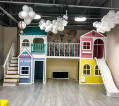 the children's play area is decorated in pastel colors