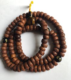 These used Tibetan prayer beads are good quality Bodhi seeds and made by Tibetan who live in Nepal. One has very good jade and Agate Guru bead. Another one has Black Jade with compassion mantra beads and Tiger eye guru bead. (1) Tiger eye guru bead. 18 inches long (2) Agate guru bead. 19 inches long Spiritual Brown Mala For Healing, Brown Spiritual Beads For Meditation, Spiritual Brown Beaded Bracelets, Spiritual Round Mala For Meditation, Spiritual Brown Mala For Meditation, Brown Spiritual Mala For Meditation, Spiritual Mala For Meditation, Spiritual Healing Brown Beads, Adjustable Polished Beads Mala For Meditation