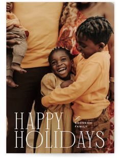 an image of two children hugging each other with the words happy holidays written on it