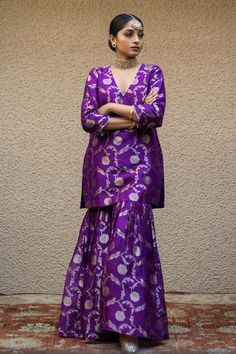 Purple three fourth sleeves V neck Banarasi kora silk kurta with woven Bahar details. Paired with a matching gathered flare sharara and a mukaish butti embellished dupatta. - Aza Fashions V Neck Kurta, Jayanti Reddy, Kurta Sharara Set, Anushree Reddy, Kurta Sharara, Rohit Bal, Silk Kurta, Tarun Tahiliani, Luxury Sale