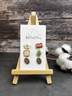 a wooden easel with some food on it