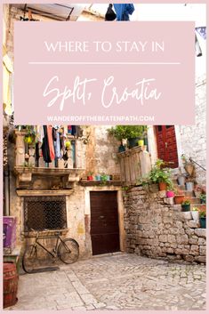 a bike parked in front of a stone building with the words where to stay in split croatia