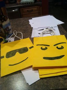 some paper bags that have been made to look like faces