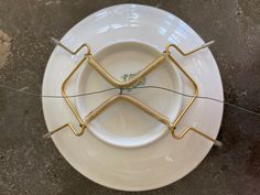 a white plate with some wire on it