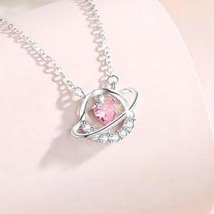 Description:Planet Dangle Heart Pendant Necklace Specifications:Material: crystal, cubic zirconia, copper,18k silverColors: silverSize: 40 cm + 5 cm extWeight: 2.3 g/pcs "Get your hands on the out of this world Planet Dangle Heart Pendant Necklace! Featuring a charming planet dangle and heart pendant, this necklace adds a touch of quirkiness to any outfit. Perfect for space lovers and anyone who loves unique accessories!✨🌎❤️" Pearl Chain Necklace, Enamel Bracelet, Cute Necklace, Pearl Chain, Crystal Heart, Exquisite Jewelry, Out Of This World, Heart Pendant Necklace, Accessories Unique