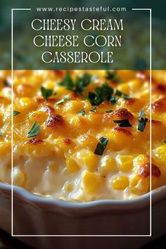 cheesy corn casserole in a white dish with green garnish