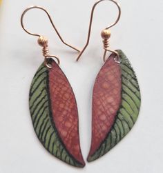 Hand crafted enamel on copper Leaf earrings. These earrings are one of a kind created by multiple firings of glass on copper. They are extremely lightweight and comfortable to wear. Kiwi Earrings, Copper Leaf, Gold Leaf Earrings, Jade Beads, Gold Texture, Leaf Shapes, Leaf Earrings, Silver Leaf, Leather Earrings