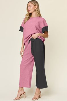 The Double Take Full Size Texture Contrast T-Shirt and Wide Leg Pants Set is a versatile and stylish addition to any wardrobe. Made with high-quality materials, this set features a unique texture contrast design that adds depth and texture to your outfit. The wide leg pants provide comfort and freedom of movement, while the t-shirt offers a flattering fit. Perfect for any occasion, this set is a must-have for fashion-forward individuals. Features: Drawstring Number of pieces: Two-piece Stretch: Multicolor Wide-leg Loungewear Sets, Cocktail Dress Curvy, Casual Cocktail Dress, Dresses Date Night, Plus Jumpsuit, Cocktail Dress Formal, Cardigan Sweater Coat, Curvy Swimwear, Bras And Panties