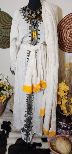 Ethiopian eritrean traditional Aksum dress  Elegant dress 100% cotton and handmade dress very beautiful! White Folk Habesha Kemis For Traditional Ceremonies, Folk Style White Habesha Kemis For Festival, White Folk Style Traditional Wear For Ceremonies, Traditional White Habesha Kemis For Festival, White Habesha Kemis With Woven Motifs For Traditional Ceremonies, Traditional White Maxi Dress For Ceremonies, White Folk Kaftan For Traditional Ceremonies, Bohemian White Habesha Kemis For Traditional Ceremonies, White Habesha Kemis For Traditional Ceremonies