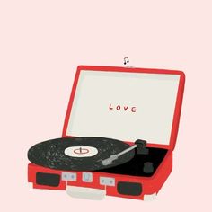 an open red record player sitting on top of a pink background with the word love written above it