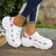 Timeless design with a leather upper, offering durability and comfort, often seen as a staple in casual streetwear. Casual Open Toe Sneakers For Spring, Clog Fashion, Waterproof Slippers, Closed Toe Wedges, White Crocs, Nursing Clogs, Chunky Platform Sandals, Garden Clogs, Garden Shoes