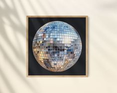 a mirror ball hanging on the wall